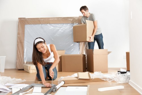 Employee reviewing ethical compliance documents for Man With Van Kennington