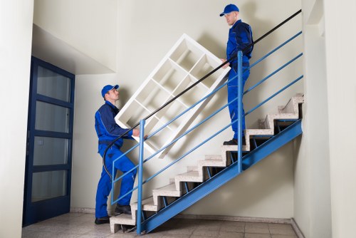 Packed workplace items ready for transport during a business relocation