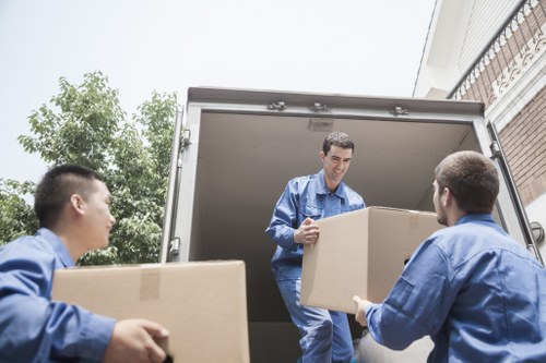 Packed household boxes and furniture ready for a Kennington relocation