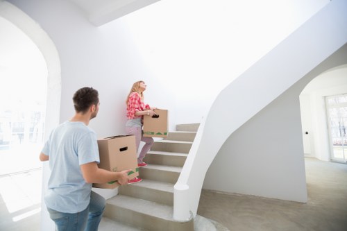 Packed boxes and wrapped household items ready for moving