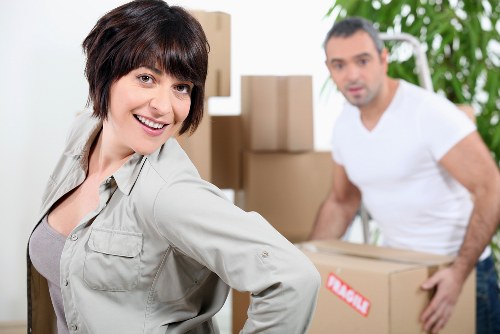 Professional movers navigating a residential street in Kennington